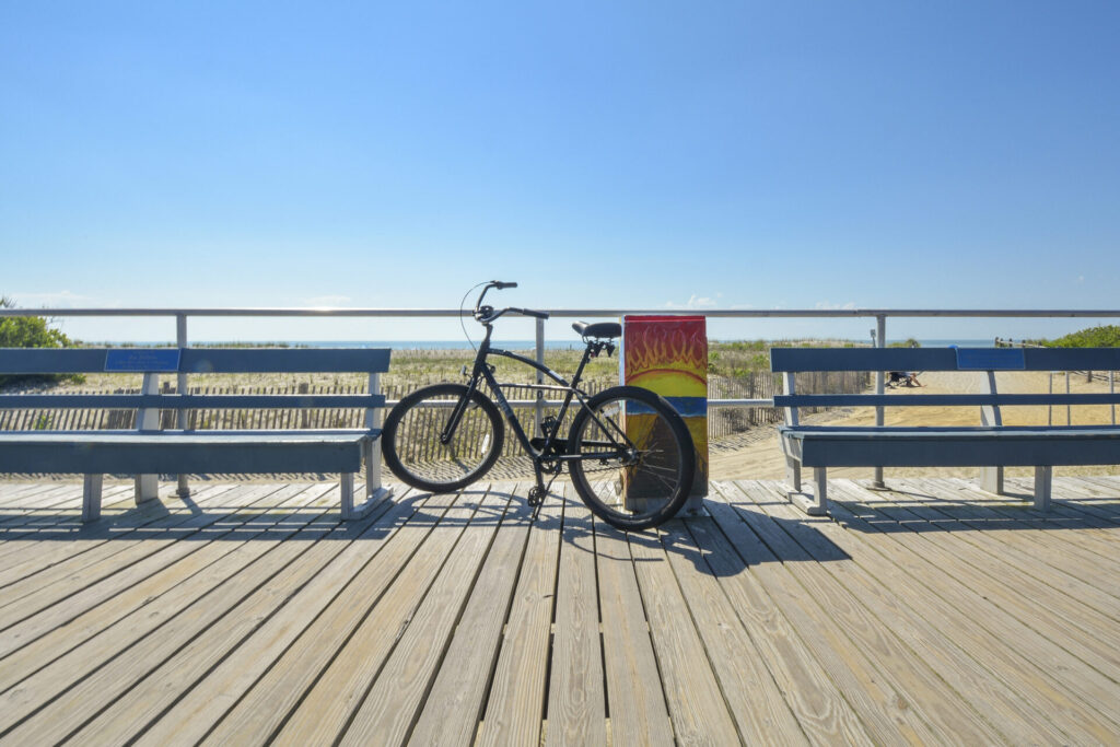 A bike propped up against the railing at The Boardwalk