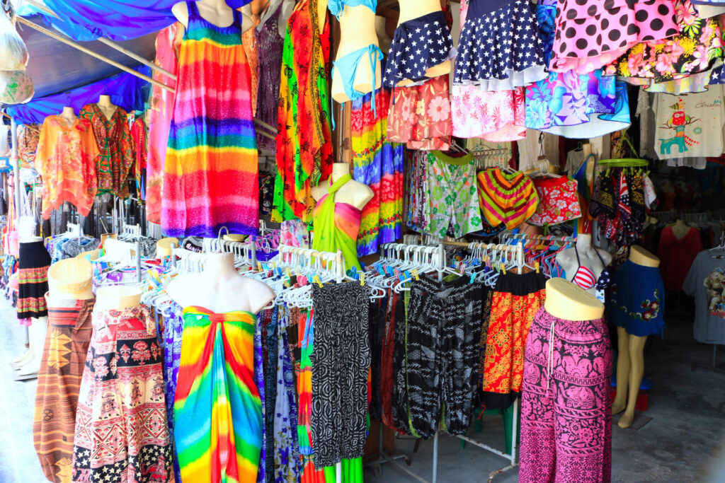 Beach shop with colorful clothes, dresses, and skirts